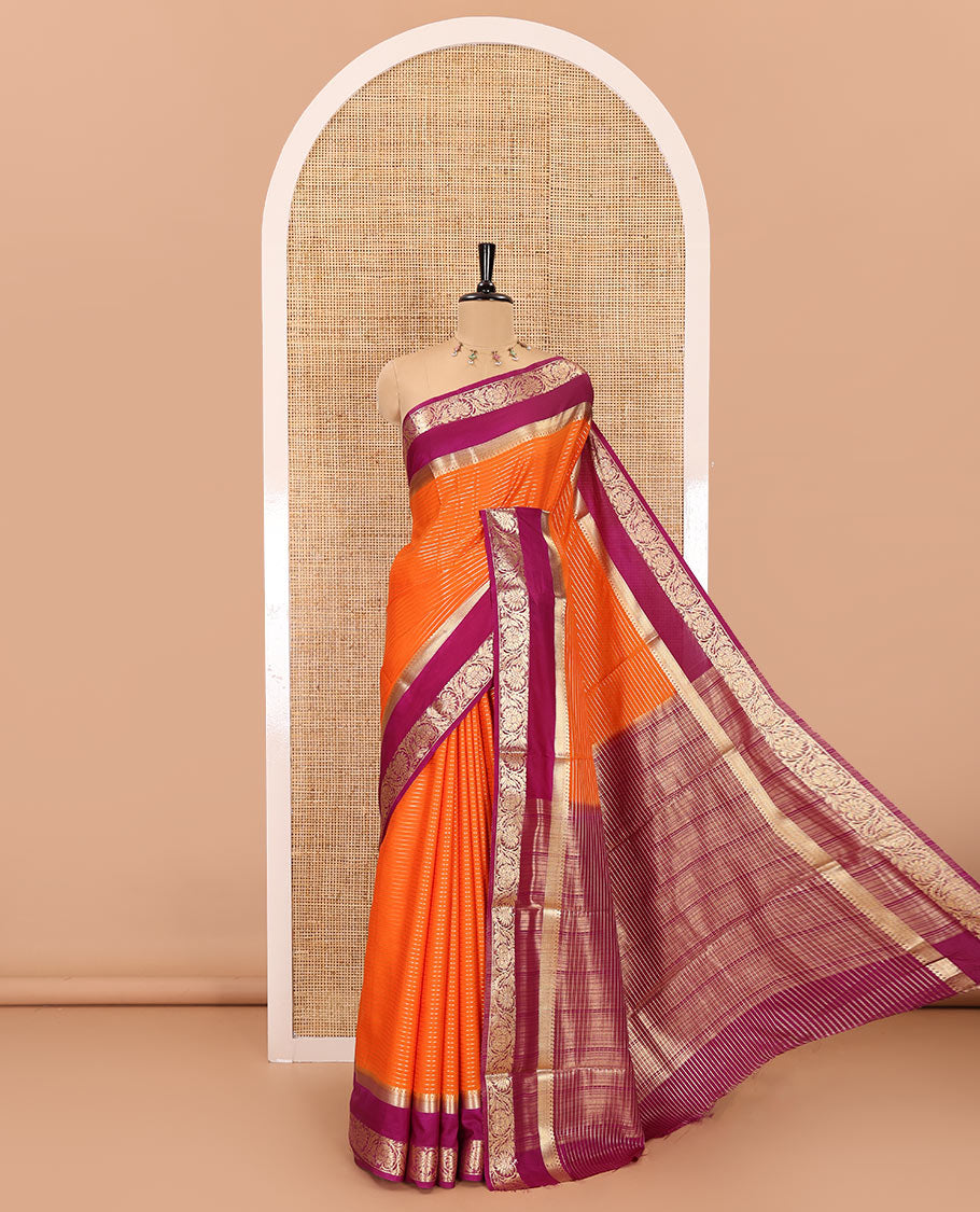 Orange gold zari horizontal striped art crepe saree, contrast rettai pettu, floral creeper zari border, zari design pallu, and a contrast zari design blouse