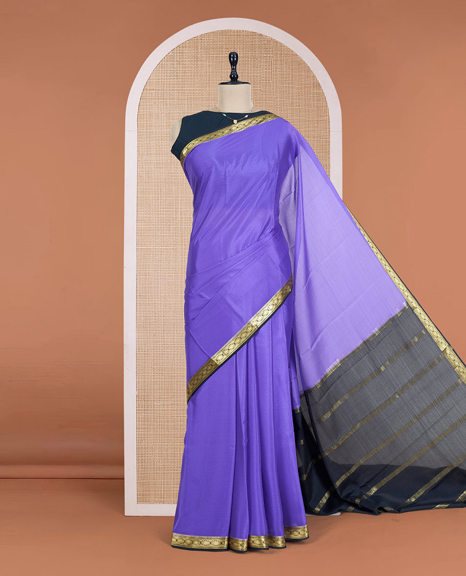 Lavender Plain Mysore Silk Saree, Complemented by a Contrast Zari Border of Traditional Designs, a Pallu Gleamed Up with Zari Stripes, and a Contrast Blouse