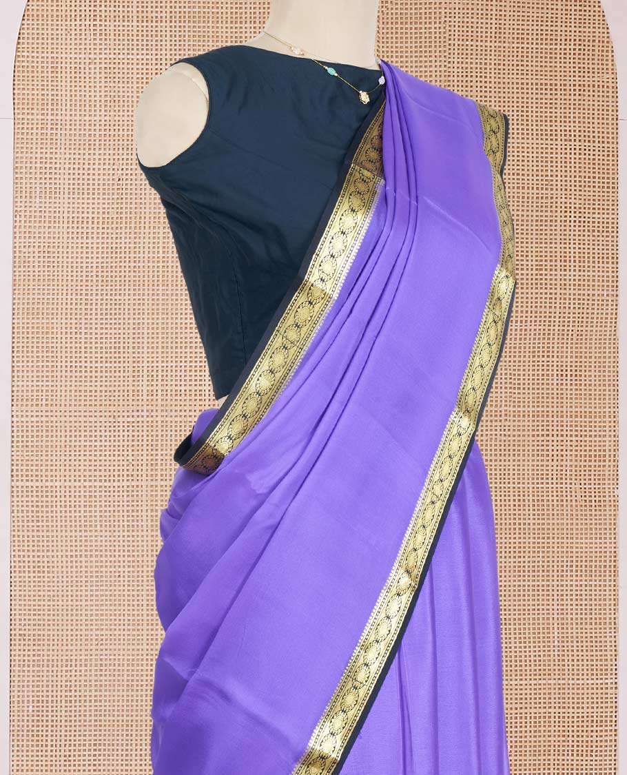 Lavender Plain Mysore Silk Saree, Complemented by a Contrast Zari Border of Traditional Designs, a Pallu Gleamed Up with Zari Stripes, and a Contrast Blouse