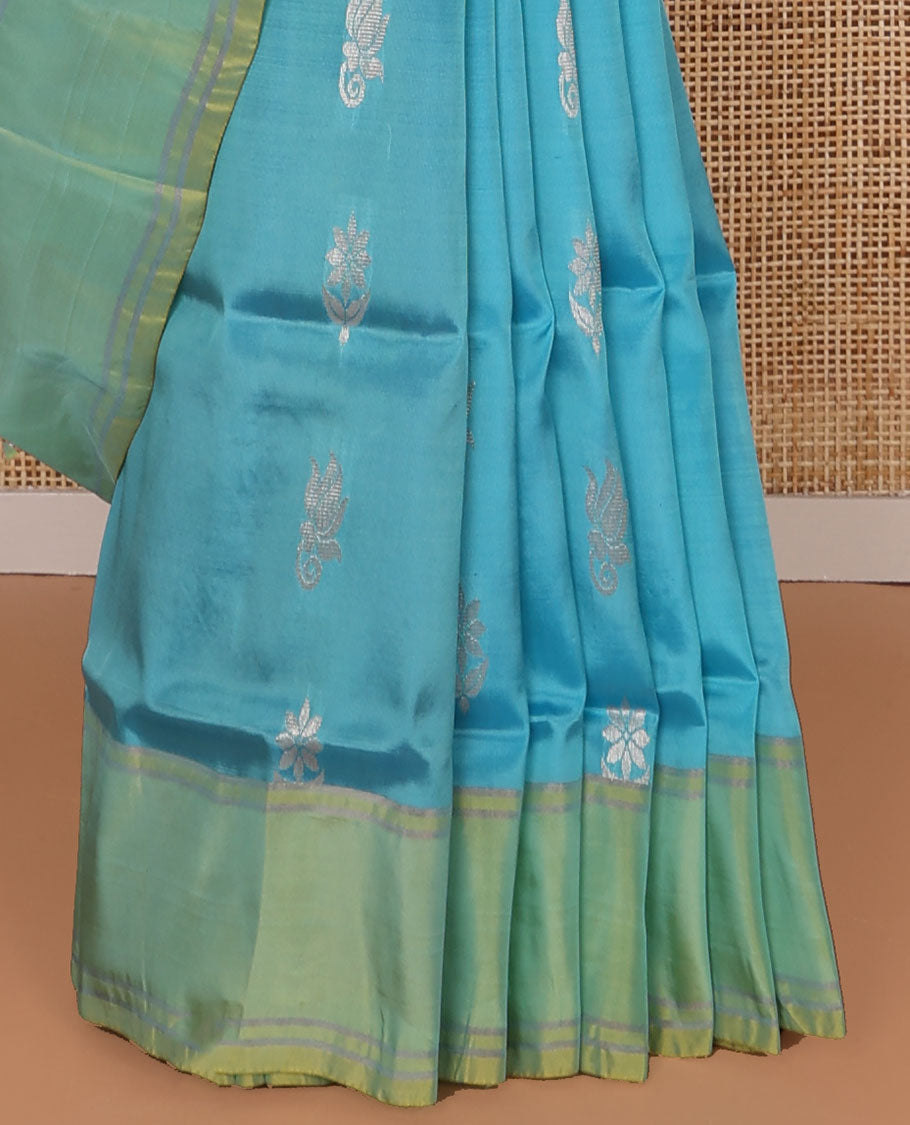 Blue floral motifs uppada saree with contrast border & floral design pallu