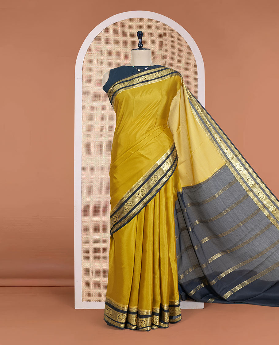 Mustrad Plain Mysore Silk Saree, Complemented by a Contrast Traditional Zari Design Border, a Pallu Gleamed Up with Zari Stripes, and a Contrast Blouse