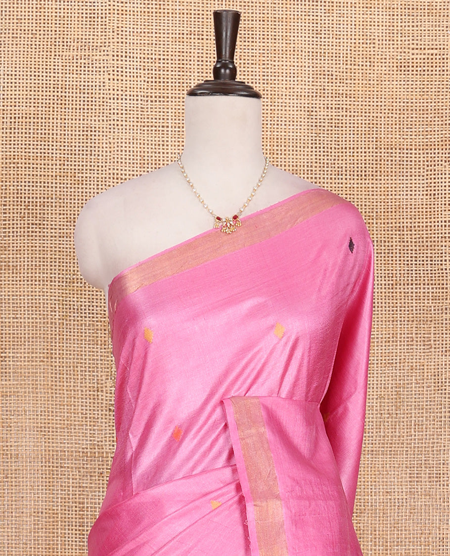 Pink buttas woven tussar saree, piping border, and pallu of floral designs