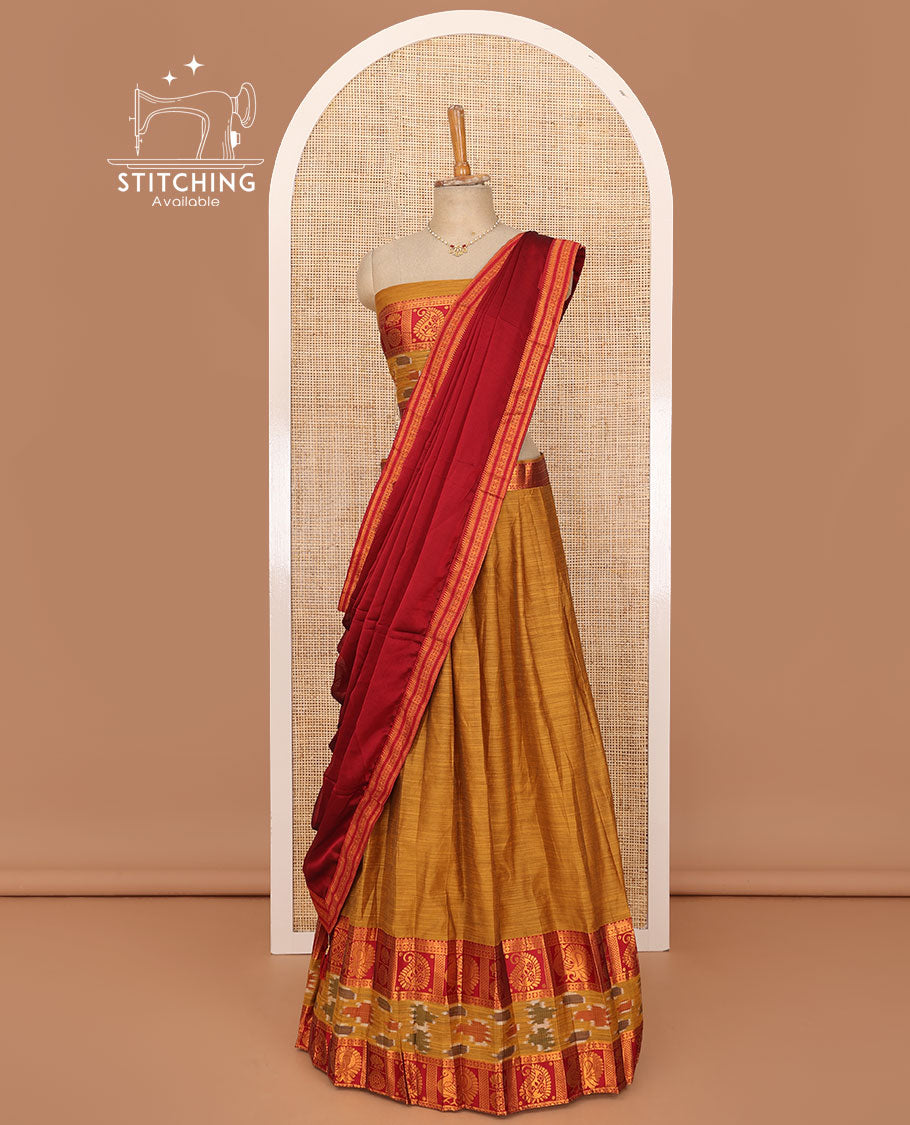Honey orange lehenga set, plain with contrast manga zari and ikkat border skirt, matching blouse and contrast zari border plain dhavani