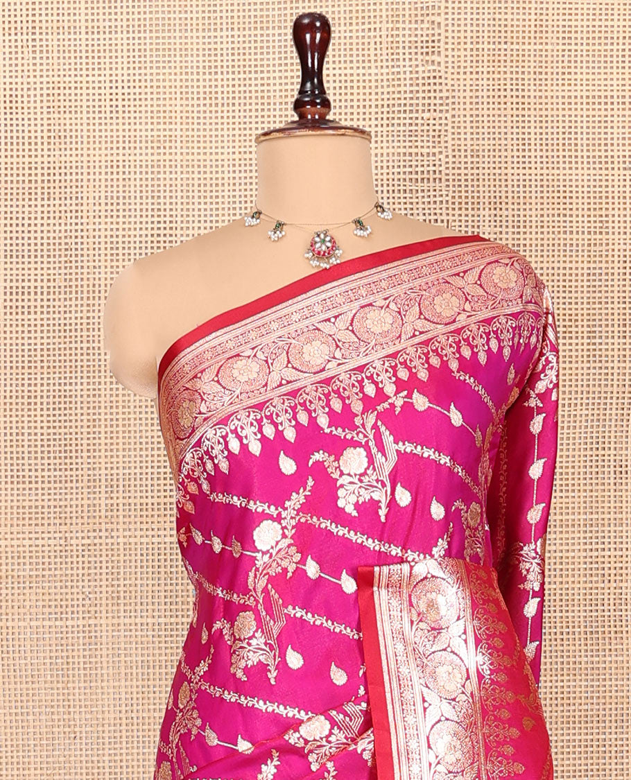 Rani Pink Banarasi Nylon Saree, Opulently Embellished with Zari Designs, Highlighted by a Traditional Zari Border, Intricate Pallu, and a Matching Blouse