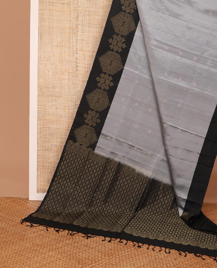 Grey zari buttas soft silk saree, contrast chakram motifs border & floral jaal pallu