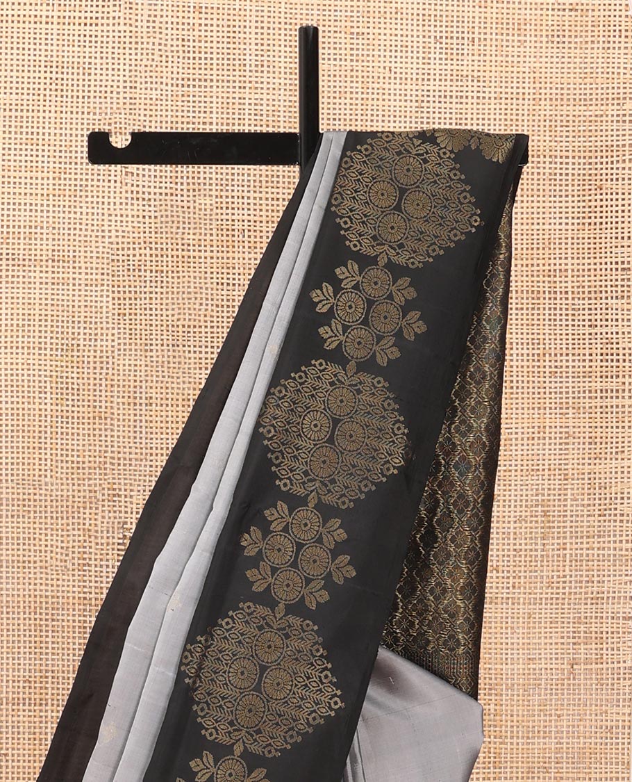 Grey zari buttas soft silk saree, contrast chakram motifs border & floral jaal pallu