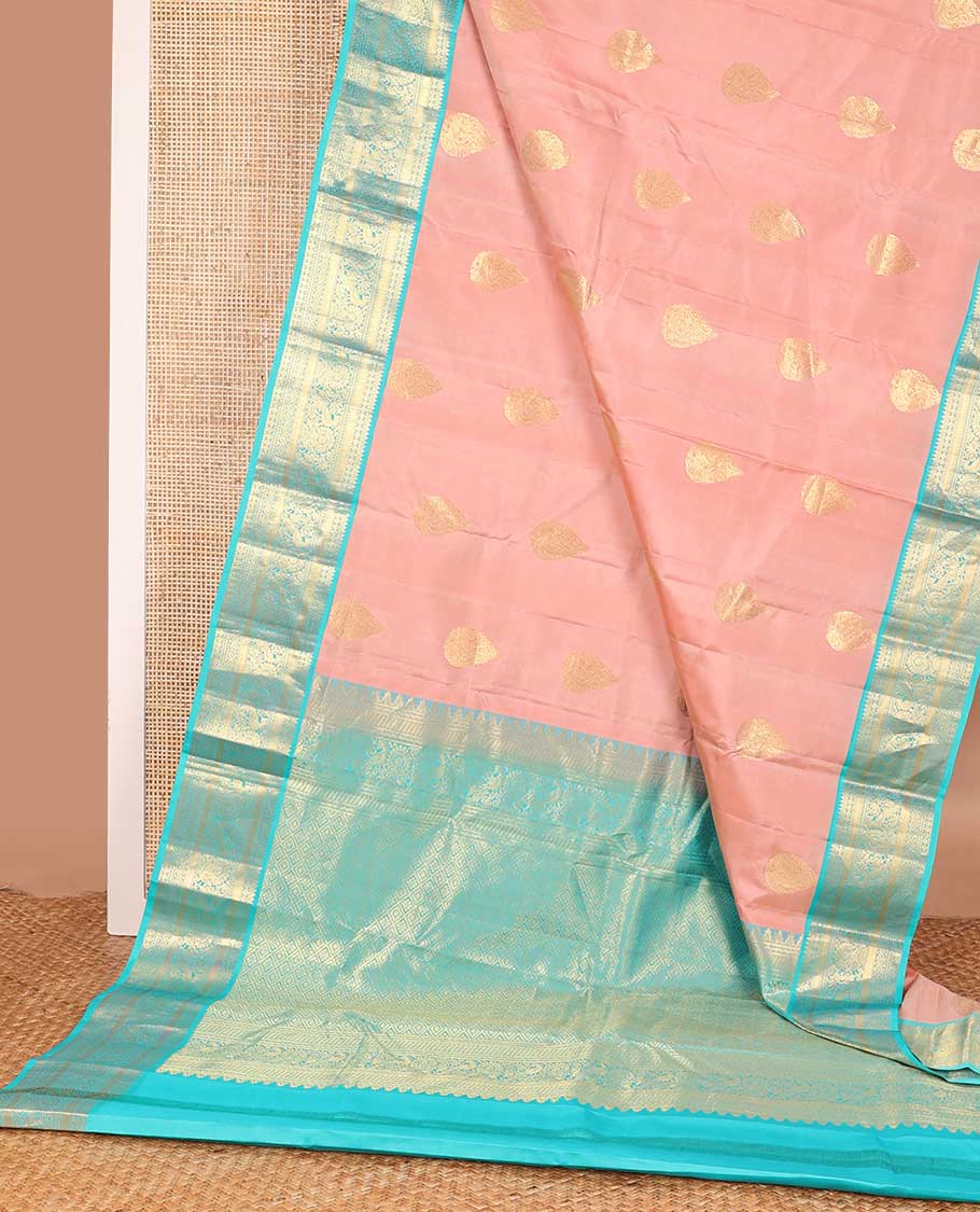 Peach thilakam buttas silk saree, contrast border of thilakam,muthu,poun, and mayil, and pallu of jaal design