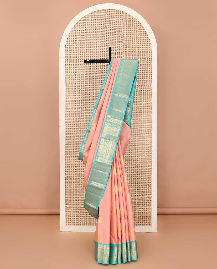 Peach thilakam buttas silk saree, contrast border of thilakam,muthu,poun, and mayil, and pallu of jaal design