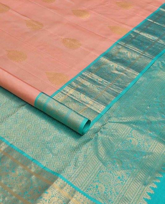 Peach thilakam buttas silk saree, contrast border of thilakam,muthu,poun, and mayil, and pallu of jaal design
