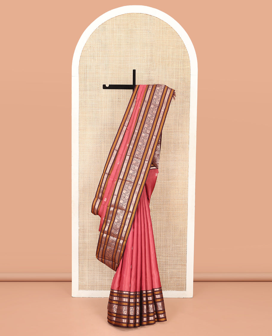 Pink Vasundhara Silk Saree, Embellished with Mayil and Chakram Buttas All Over Its Body, Complemented by a Contrast Border of Thilakam, Neli, Laddu Kamalam, and Kodi Visiry Designs, Grand Pallu of Butta Enclosed Checks, and Paired with a Contrast Blouse