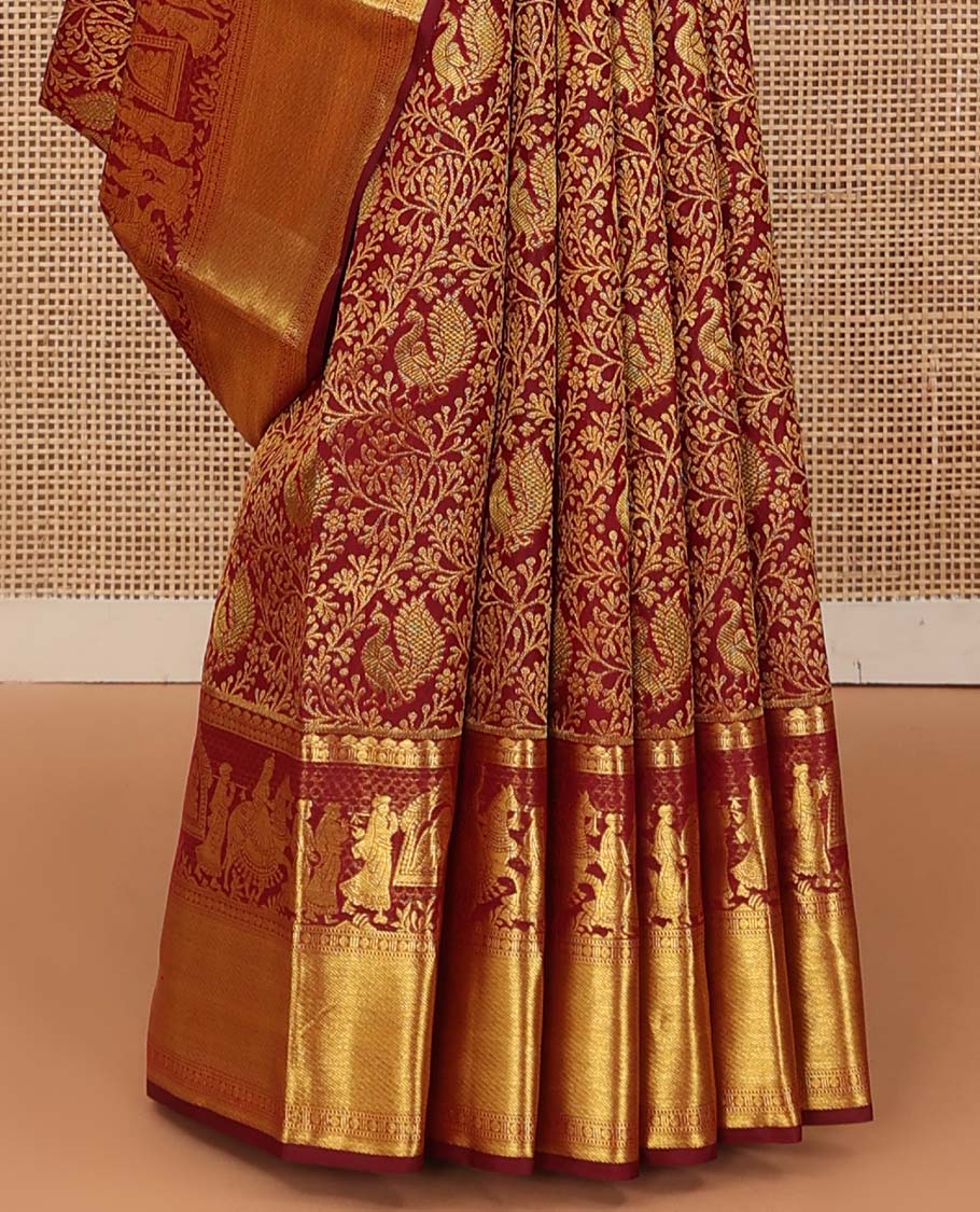 Maroon jacquard wedding silk saree, traditional zari border of wedding palanquin design, and butta enclosed hexogon grid pallu