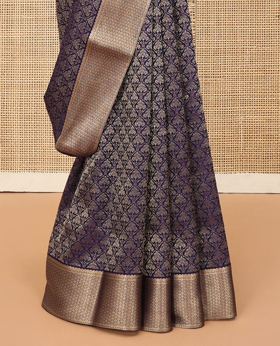 Blue jacquard satin silk saree, zari jaal patterned border, and intricate pallu