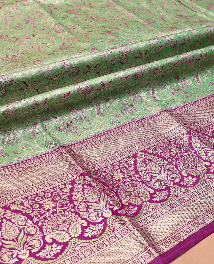 Green Art Silk Material Half Saree Set, Accentuated with Jacquard Design Skirt, a Contrast Meenakari Border, Contrast Blouse, and an Intricately Designed Dhavani