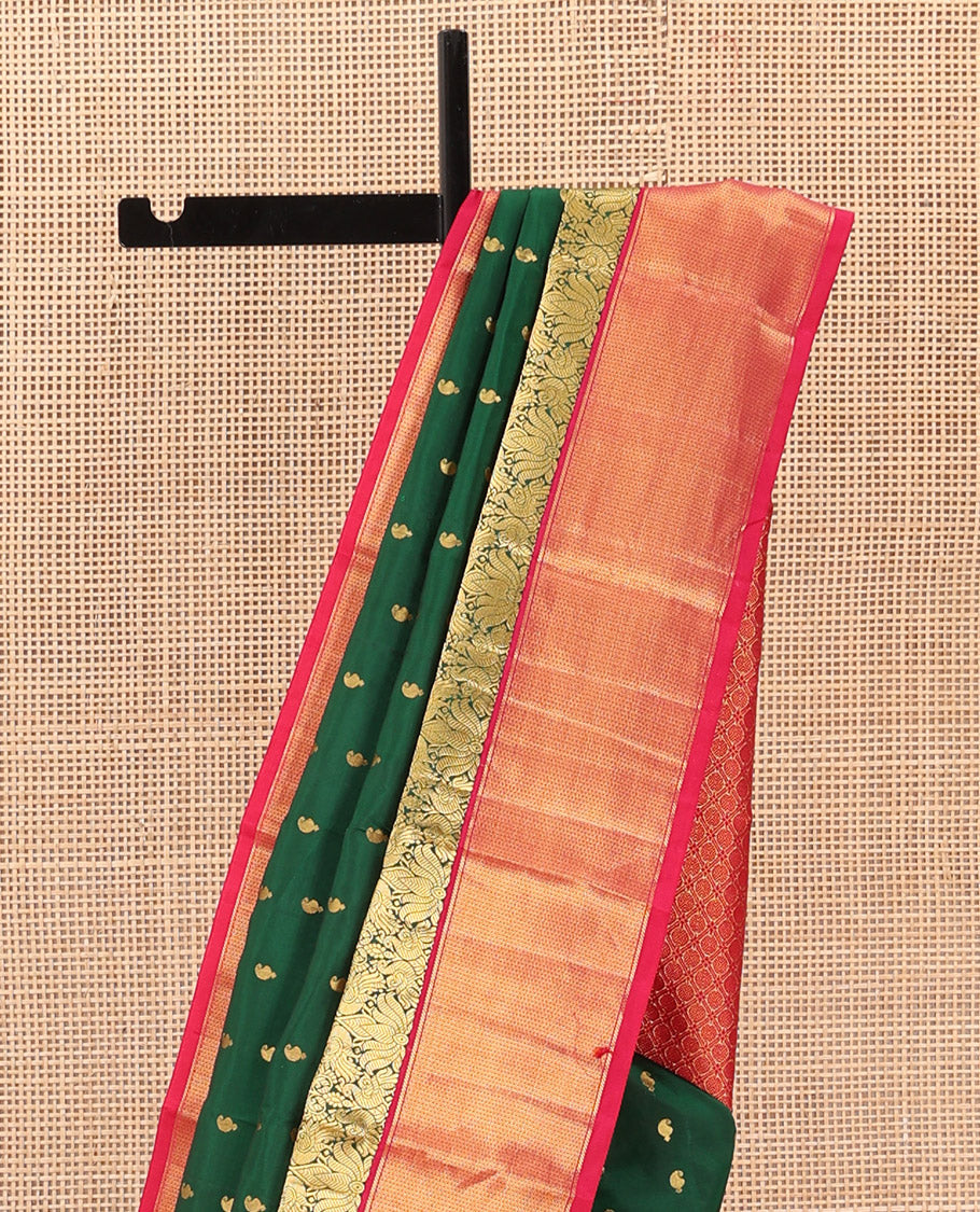Green paisley zari buttas Bangalore silk saree, contrast zari border of peacock designs, and pallu of ogee patterns