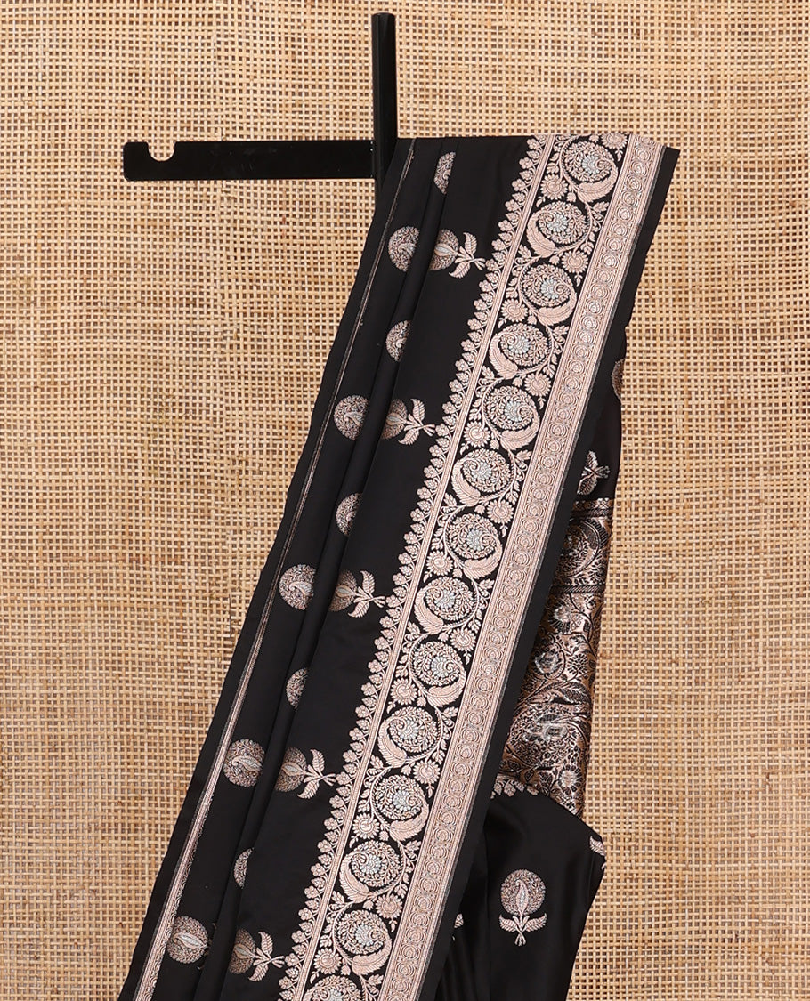 Inky black floral buttas banarasi silk saree, floral creeper zari woven border, and floral jaal design pallu