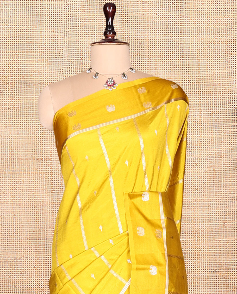 Yellow Satin Silk Saree, Gleamed Up with Buttas and Stripes, Highlighted by Elephant Motif Border, Grand Jaal Pallu, and a Matching Blouse