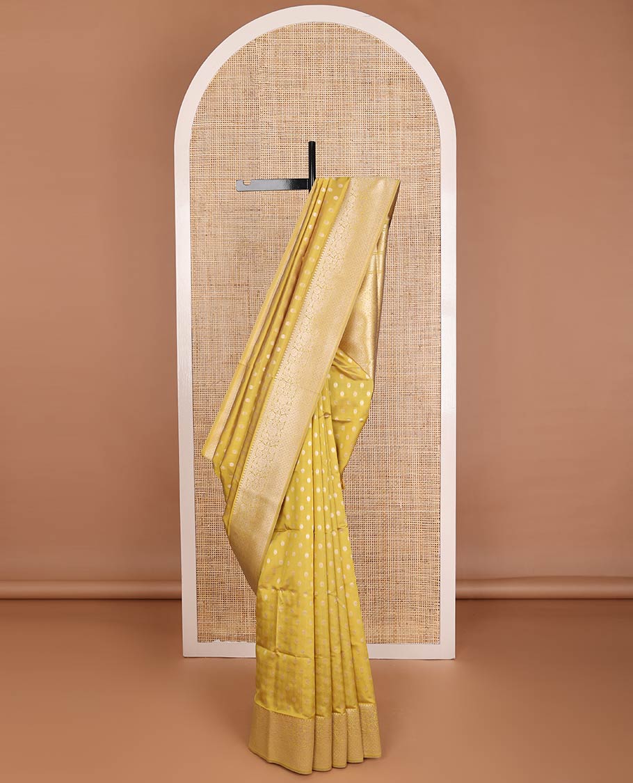 Yellow zari buttas butter silk saree, traditional zari design border & zari floral design weave pallu