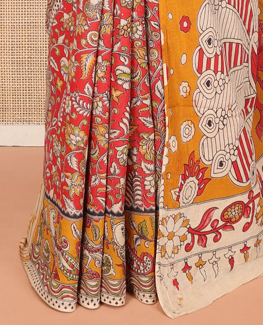 Red Machine Printed Kalamkari Cotton Saree Features Floral Peacock Design, a Contrast Peacock-Printed Border, a Peacock-Printed Pallu, and a Contrast Blouse
