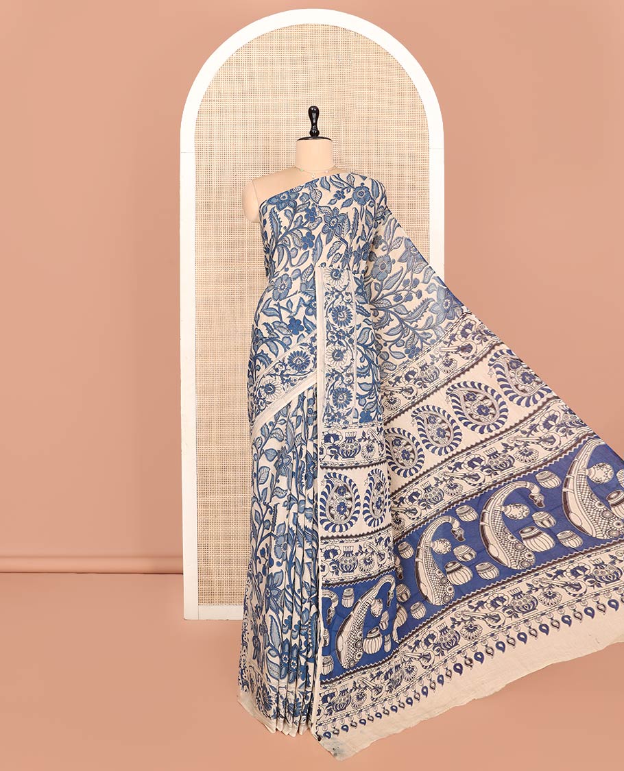 Blue Machine-Printed Kalamkari Cotton Saree Features Floral Vine Design, a Floral Printed Border, Pallu of Musical Instruments, and a Matching Blouse