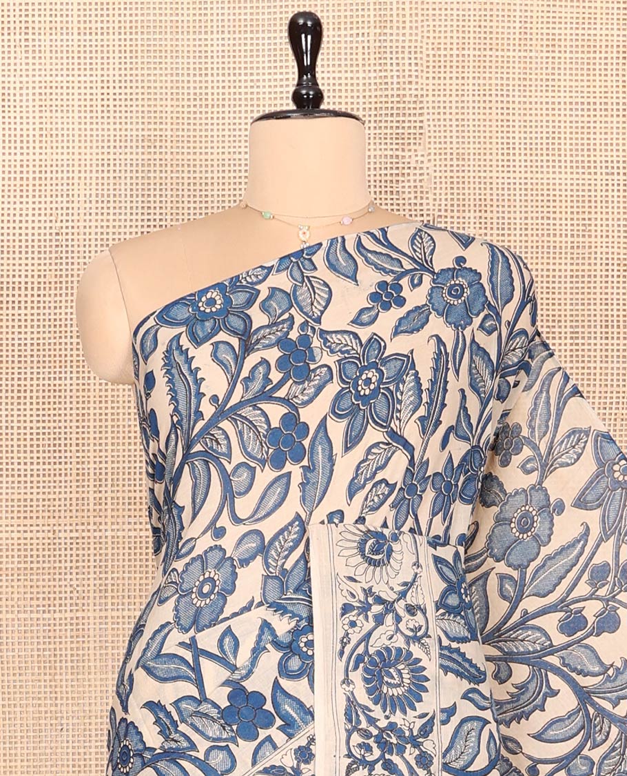 Blue Machine-Printed Kalamkari Cotton Saree Features Floral Vine Design, a Floral Printed Border, Pallu of Musical Instruments, and a Matching Blouse