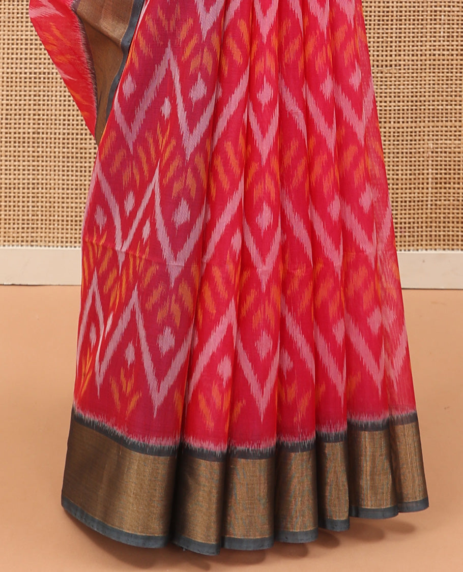 Pink Pochampally Ikkat-style chevron design silk cotton saree, contrast bavanji zari border, and ikkat design pallu