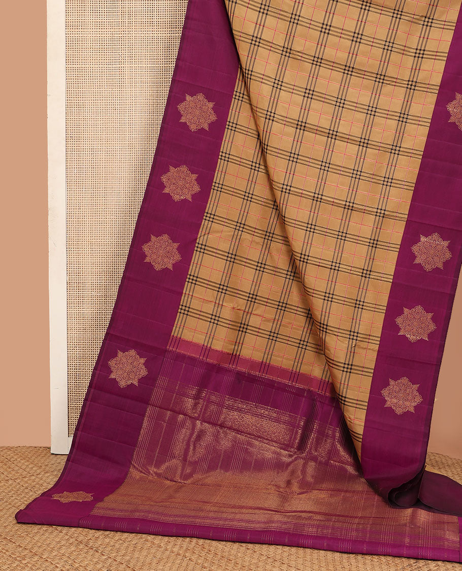 Dark sandal burberry-style checked Kanchipuram silk saree, contrast kolam motifs, zari border, and zari design pallu