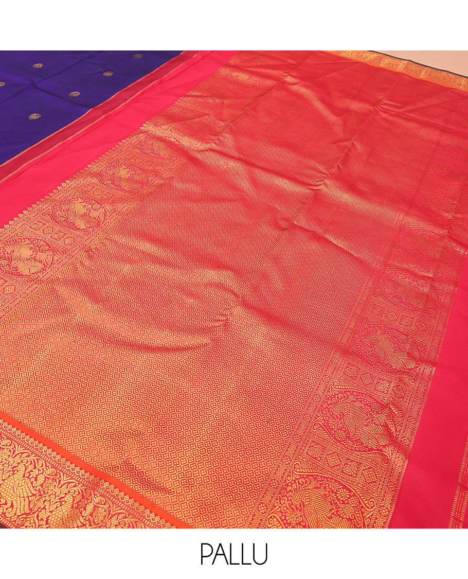Blue mayil buttas Kanchipuram silk saree, contrast border of thilakam mokku, muthu, and mayil designs, and jaal pallu