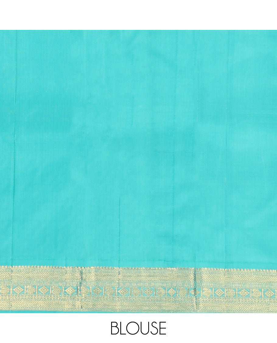 Purple plain Kanchipuram silk saree, contrast korvai border of thilakam mokku, muthu, vanki, lavangam, neli, diamond, and manga designs, and jaal pallu