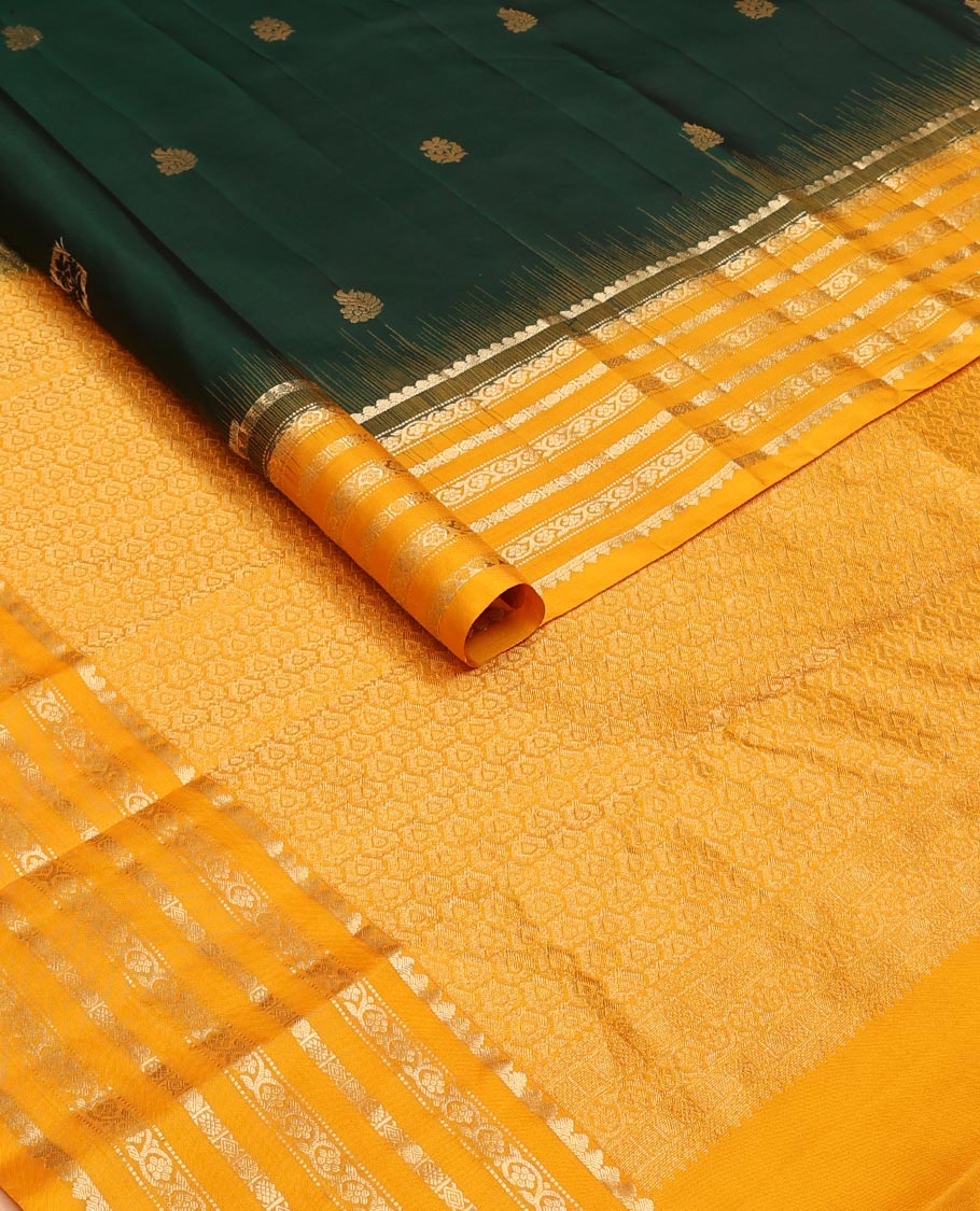 Green zari buttas silk saree, contrast border of muthu,dhavana kodi, laddu kamalam & diamond, & intricate pallu