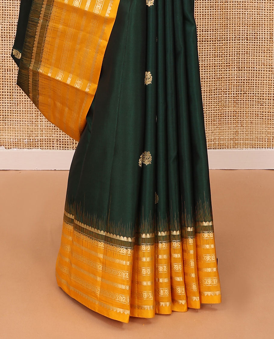 Green zari buttas silk saree, contrast border of muthu,dhavana kodi, laddu kamalam & diamond, & intricate pallu