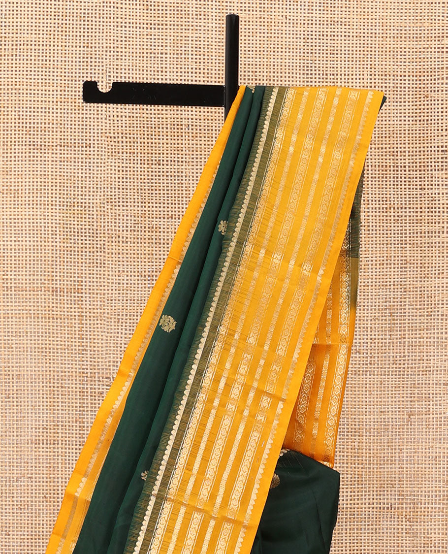 Green zari buttas silk saree, contrast border of muthu,dhavana kodi, laddu kamalam & diamond, & intricate pallu