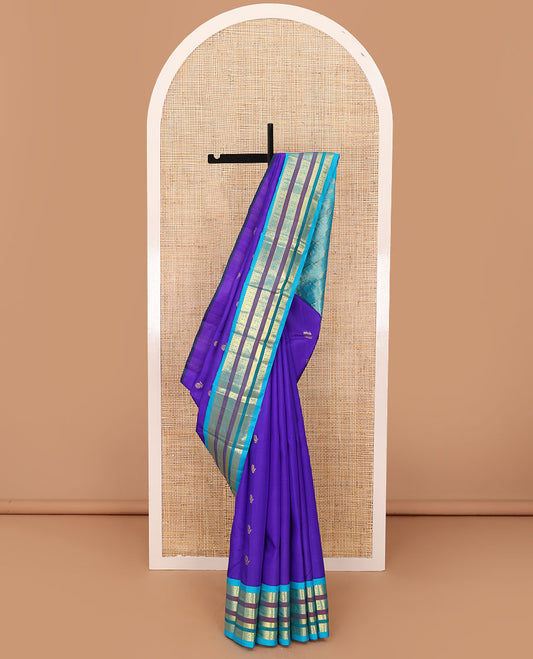 Blue zari buttas Kanchipuram silk saree, contrast one-sided border of salangai,rudraksham,neli & mayil design & zari design pallu