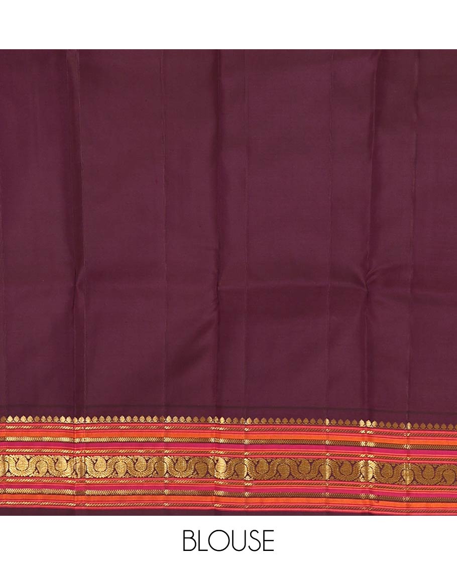 Turquoise zari buttas Kanchipuram silk saree, contrast korvai border of salangai, nuli nagam, kathir, and dhavanai manga kodi designs, and mayil kann woven pallu