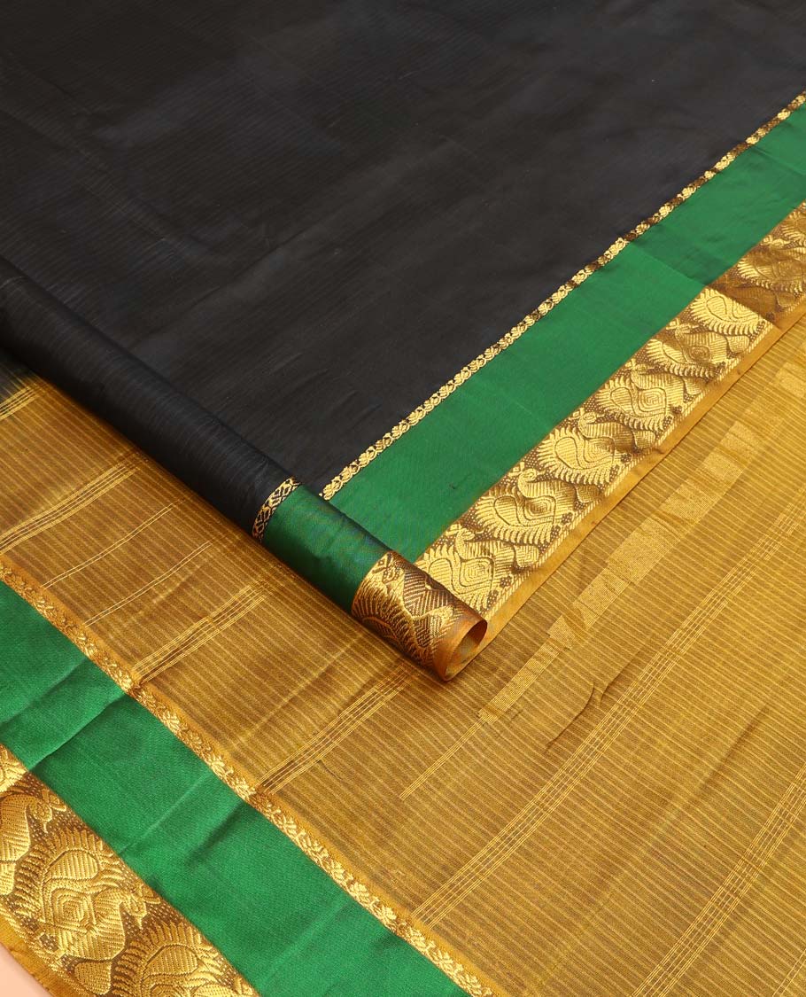 Black striped Kanchipuram silk saree, contrast rettai pettu border of salngai, and mayil designs, and pallu of stripes, and thazampoo rekku designs