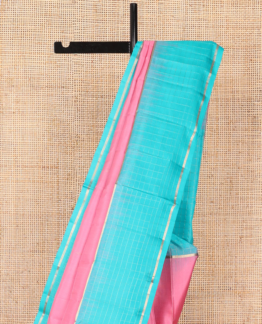 Pink plain design soft silk saree, contrast zari checked blue border & pallu of chevron pattern