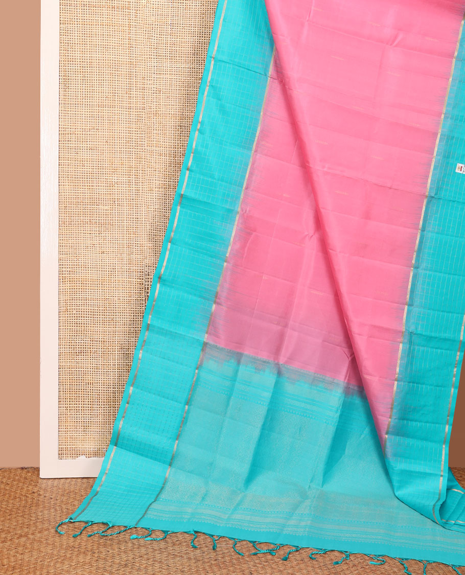 Pink plain design soft silk saree, contrast zari checked blue border & pallu of chevron pattern