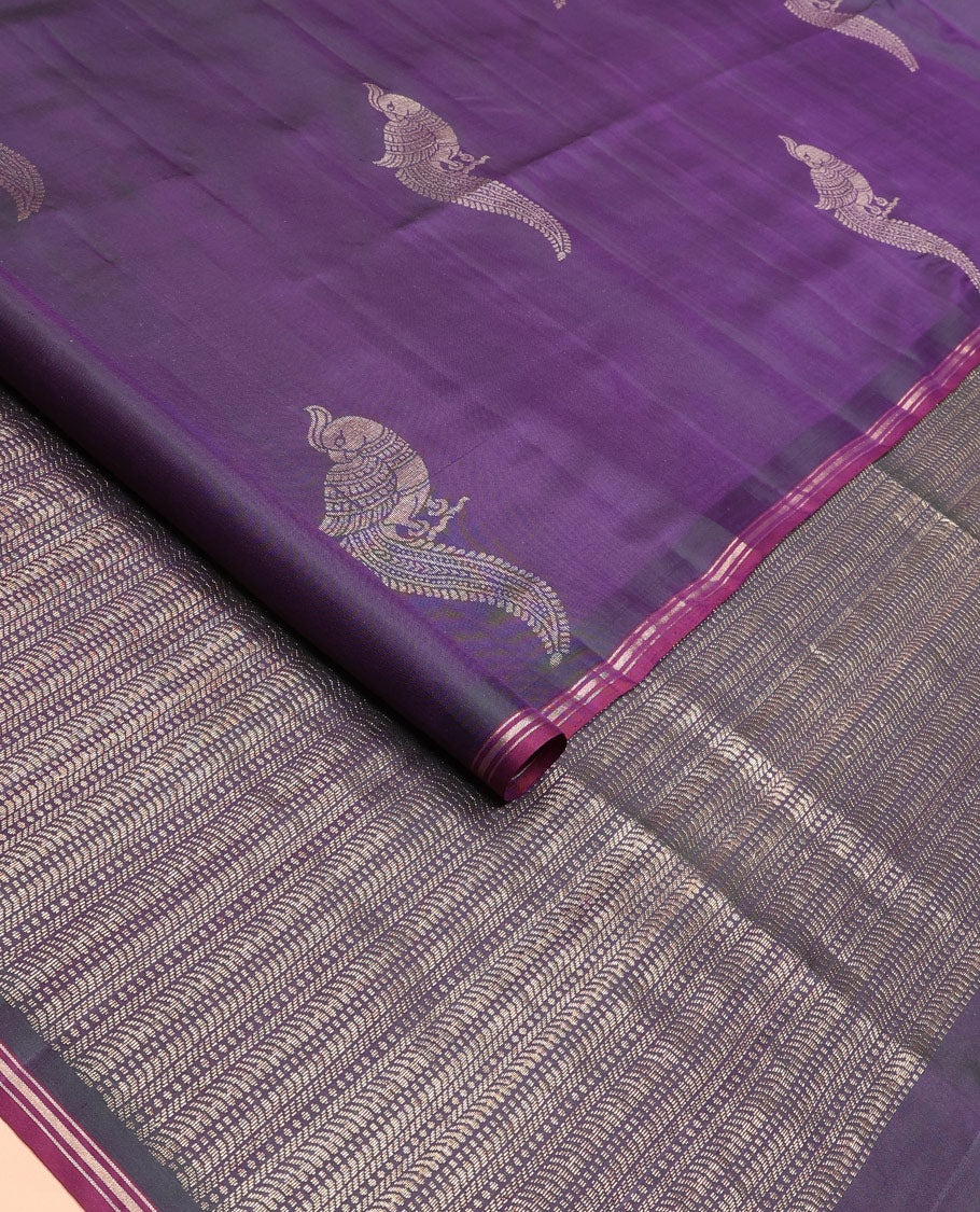 Violet mayil buttas soft silk saree, contrast zari piping border, and geometric patterned pallu