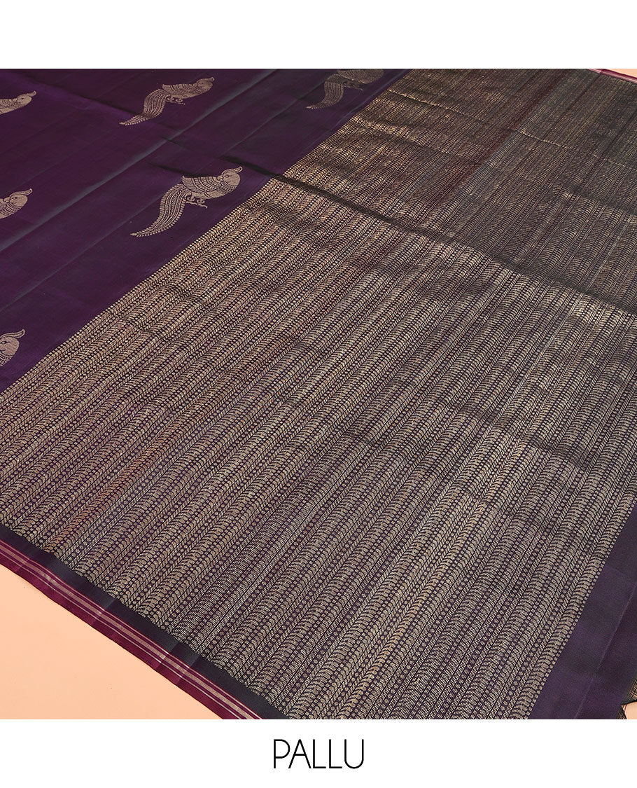 Violet mayil buttas soft silk saree, contrast zari piping border, and geometric patterned pallu