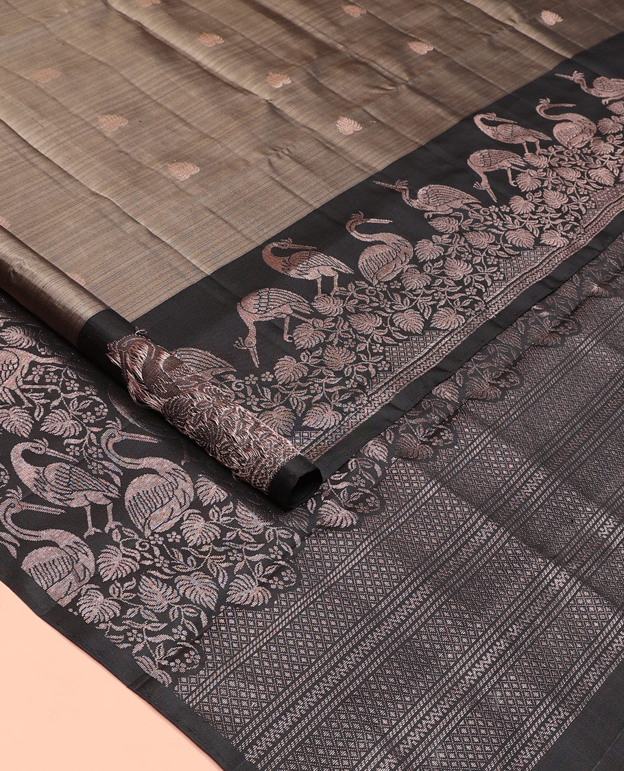 Grey zari buttas soft silk saree, contrast floral and bird motifs border, and pallu of jaal, floral, and bird designs