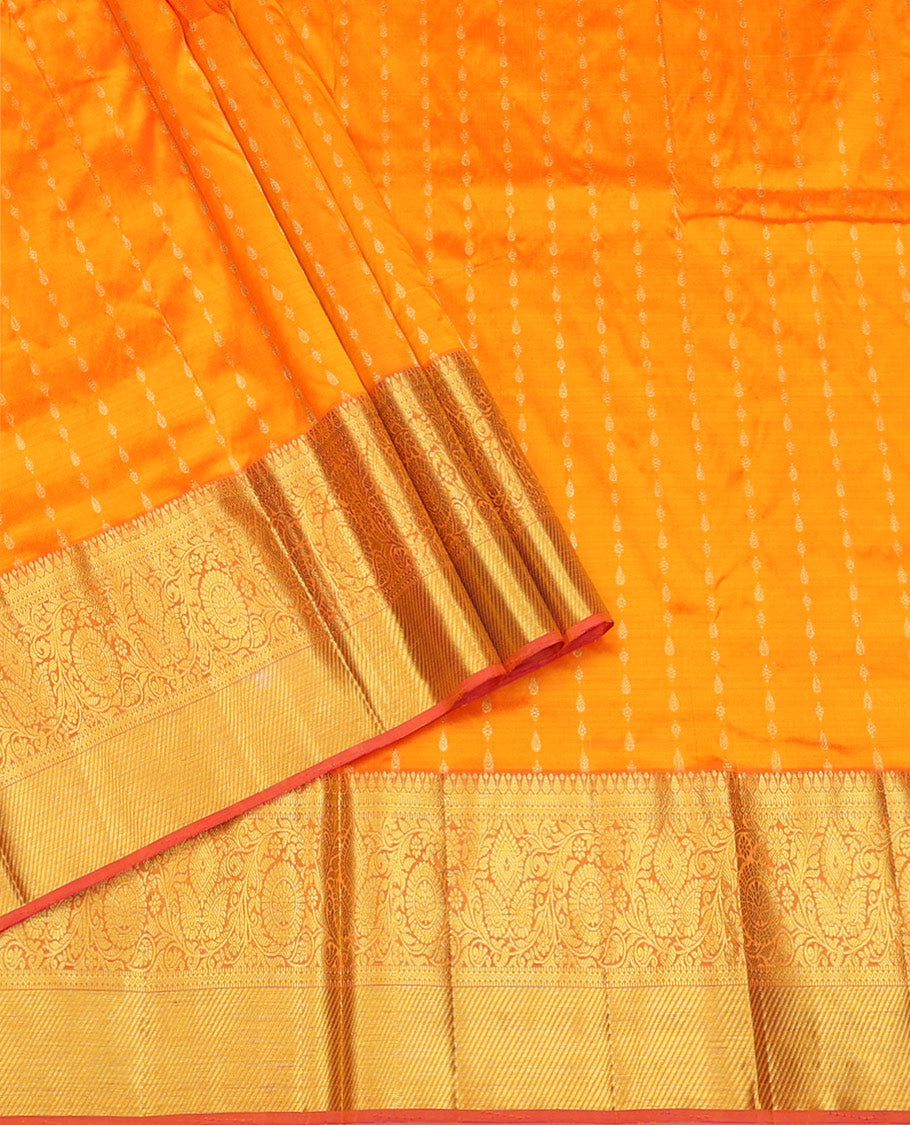 Yellow Pure Silk Pavadai Material, Gleamed Up with Zari Buttas on Its Skirt, a Contrast Traditional Zari Border, and a Contrast Blouse