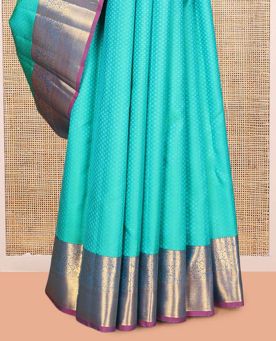 Blue Embossed Parambara Silk Saree, Elevated with Zari Buttas, a Contrast Border of Kodi Visiry Designs, Pallu of Scallop Design, and Contrast Blouse