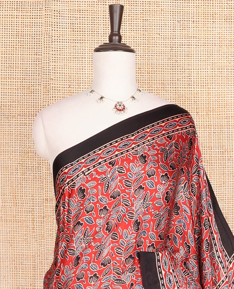 Red floral design modal saree with contrast border & floral design pallu