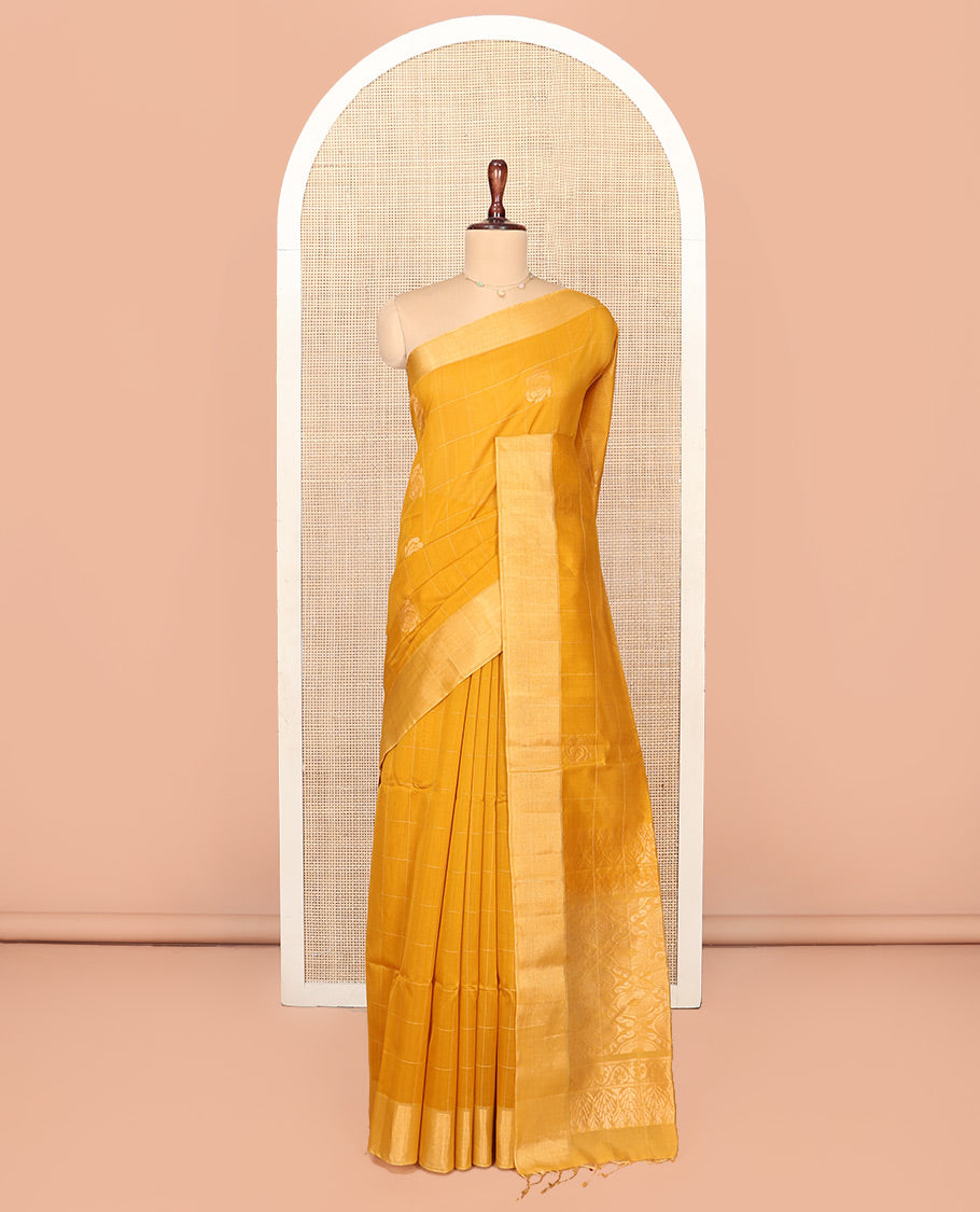 Yellow Silk Cotton Saree, Subtly Sparkled With Butta Enclosed Checks On Its, Subtle Bavanji Border, Grand Jaal Pallu and Paired with a Matching Blouse
