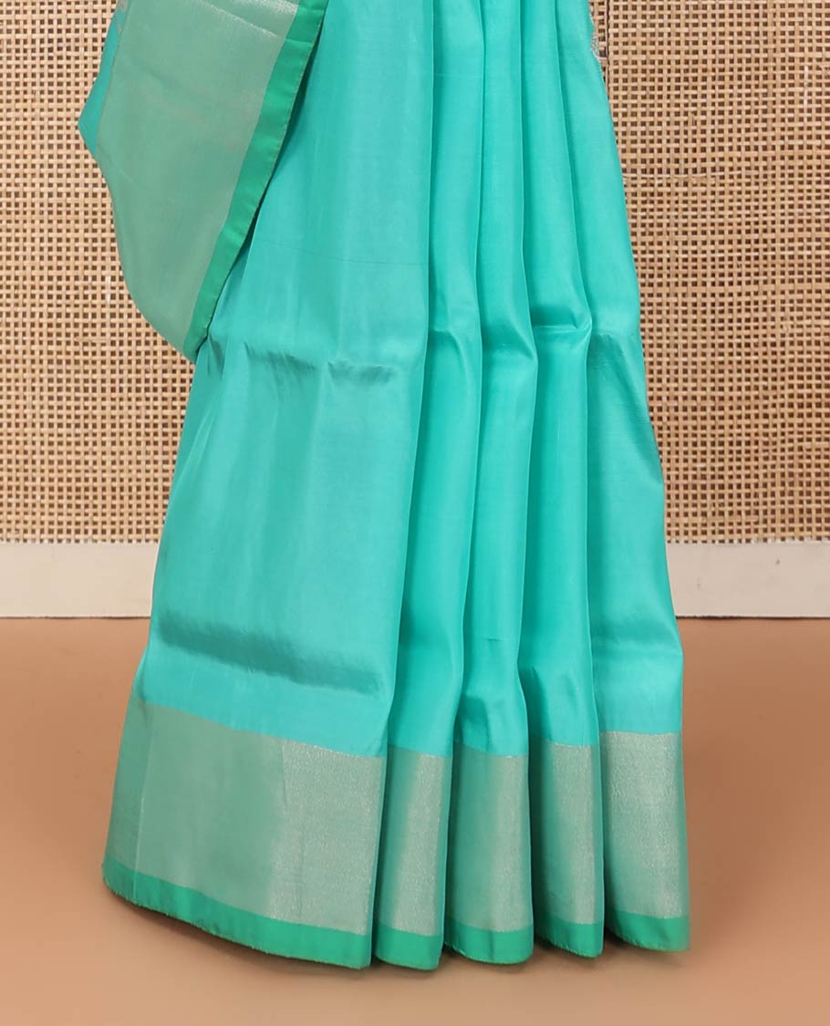 Blue zari buttas Uppada saree, bavanji border, and contrast intricately designed pallu