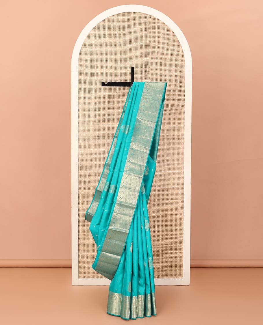 Blue zari buttas silk saree, zari border and pallu steeped with rekku, mayil, rudraksham, manga, kathir, cross neli and laddu kamalam