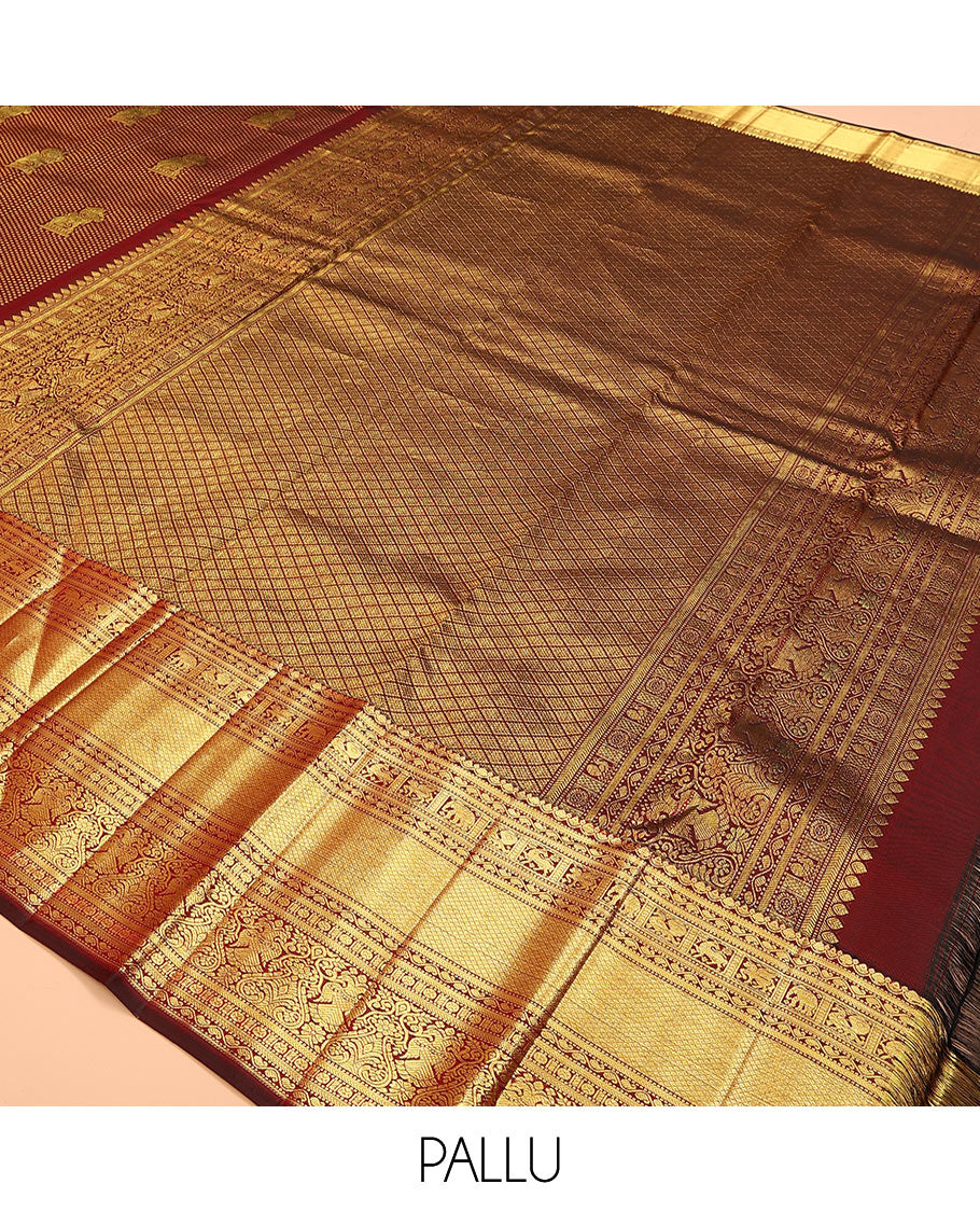 Maroon singam buttas woven kanchipuram silk saree, zari border of muthu, banaras, manga kodi, yaali, kuthirai, yaanai, mayil kann, rudraksham, and iruthalai pakshi, and jaal pallu