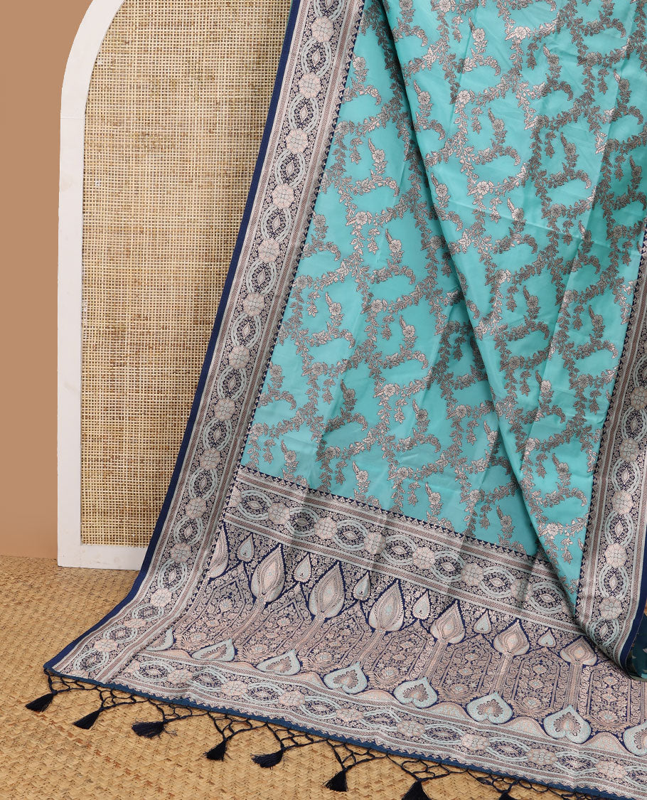 Cyan floral jaal design butter silk saree with contrast intricate zari design border & floral design pallu