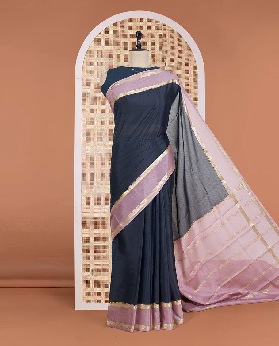 Black Plain Mysore Silk Saree, Complemented by a Contrast Rettai Pettu Border of Traditional Zari Designs, a Subtly Sparkled Pallu of Zari Stripes, and a Contrast Blouse