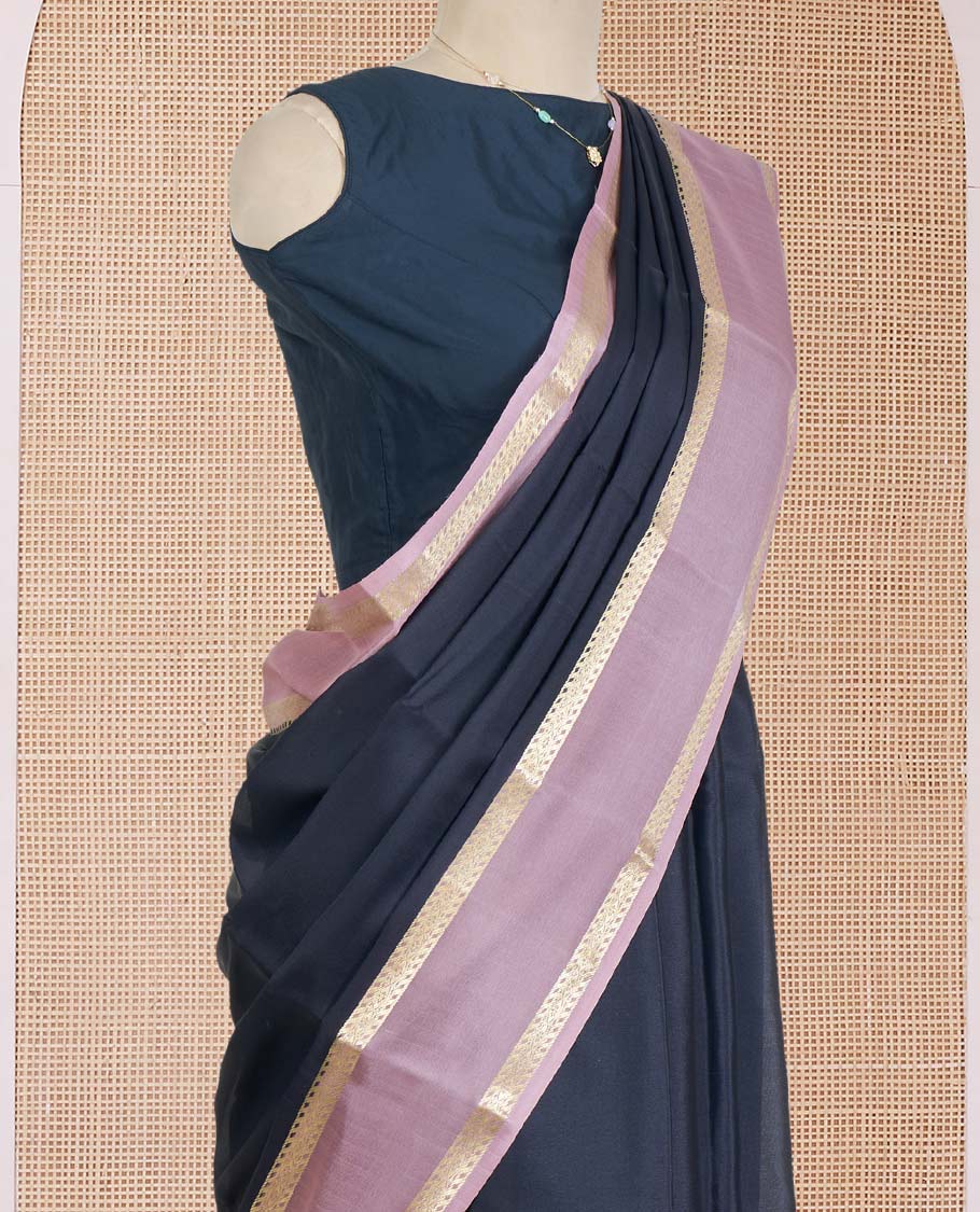 Black Plain Mysore Silk Saree, Complemented by a Contrast Rettai Pettu Border of Traditional Zari Designs, a Subtly Sparkled Pallu of Zari Stripes, and a Contrast Blouse