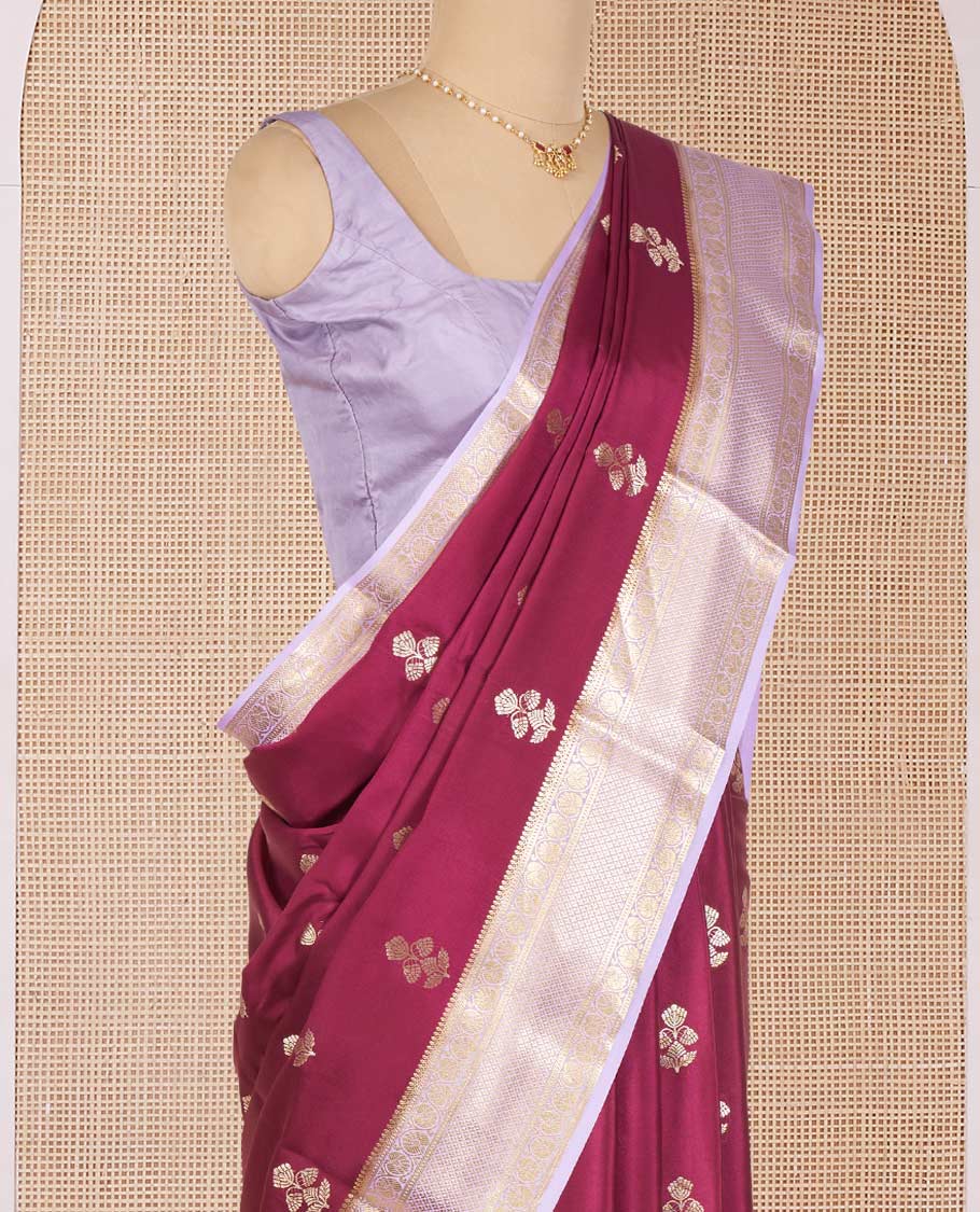 Maroon Mysore Silk Saree Enthralled with Floral Zari Buttas, Complemented by a Contrast Border Featuring Floral Creeper and Jaal Designs, Gleaming Zari Pallu of Jaal Designs, and Paired with a Contrast Blouse